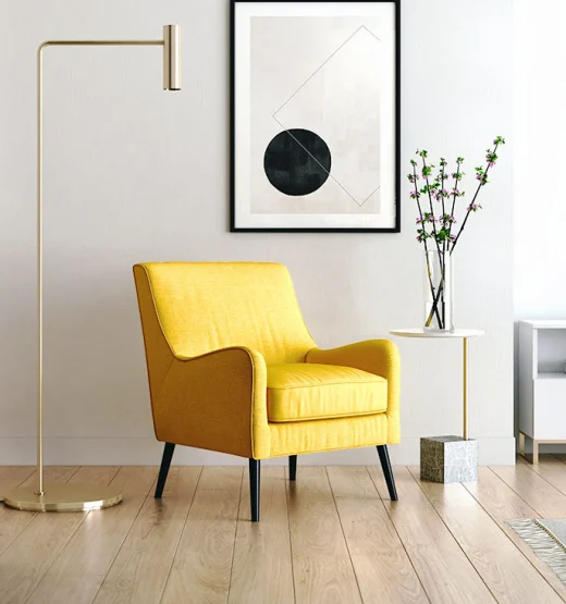 Comfortable yellow chair with floor lamp in therapy space